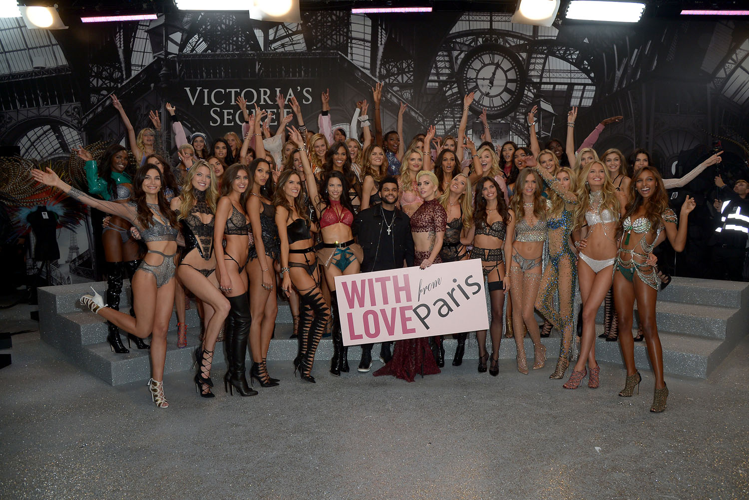 PARIS, FRANCE - NOVEMBER 30: Models pose backstage with Lady Gaga and The Weeknd during the Victoria's Secret Fashion Show on November 30, 2016 in Paris, France. (Photo by Dominique Charriau/Getty Images for Victoria's Secret)